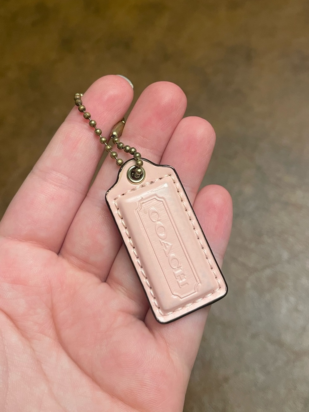 Pink coach hangtag